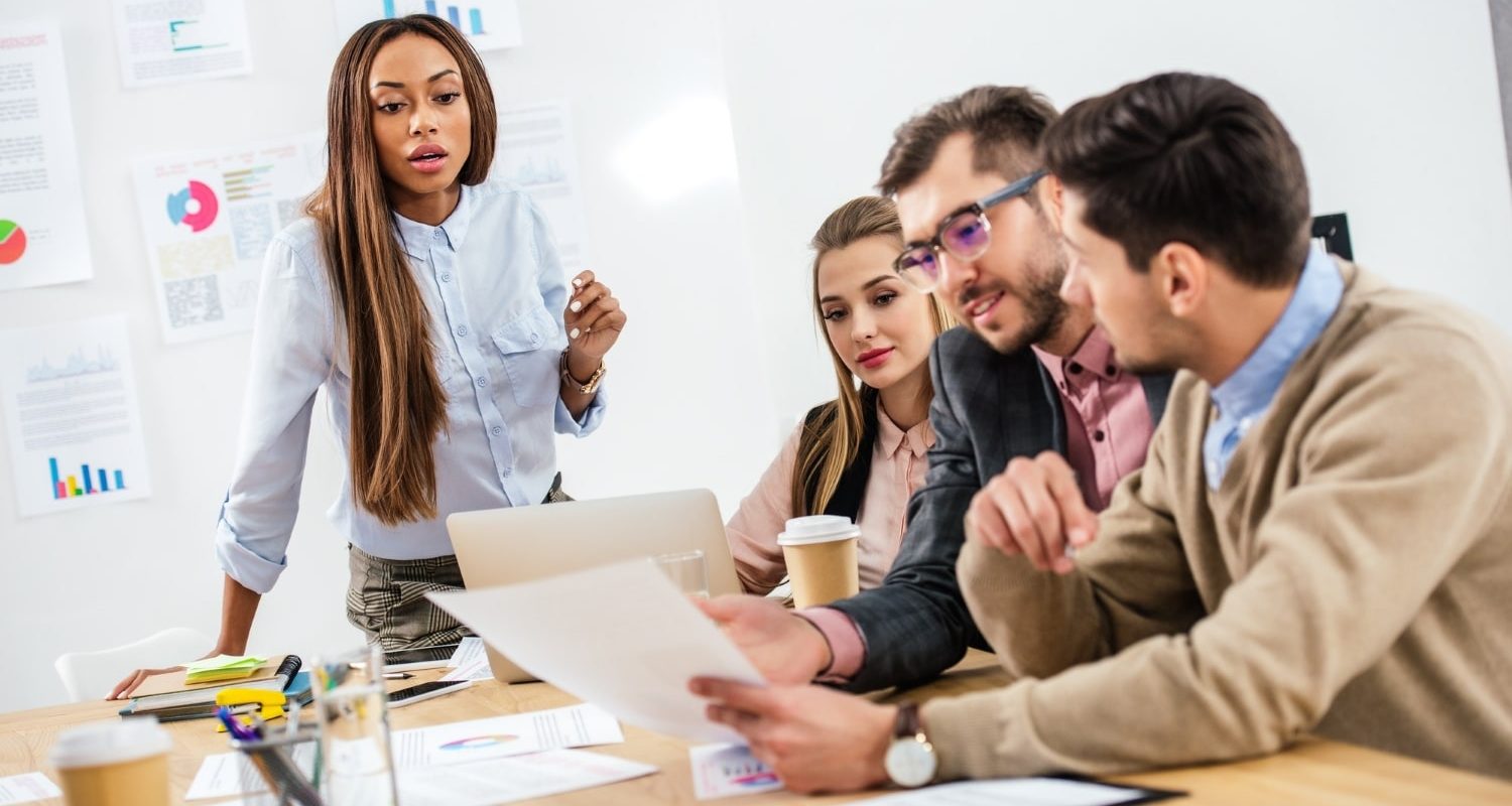 multicultural-group-of-marketing-managers-working-on-project-together-in-office-min.jpg